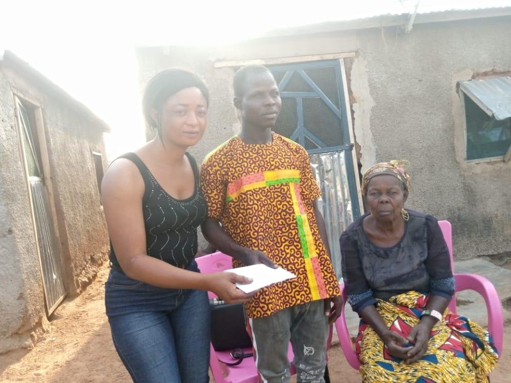 Gladys Apuweni Makes Donation to Shadrach Amobire on Behalf of Sungbiela Foundation